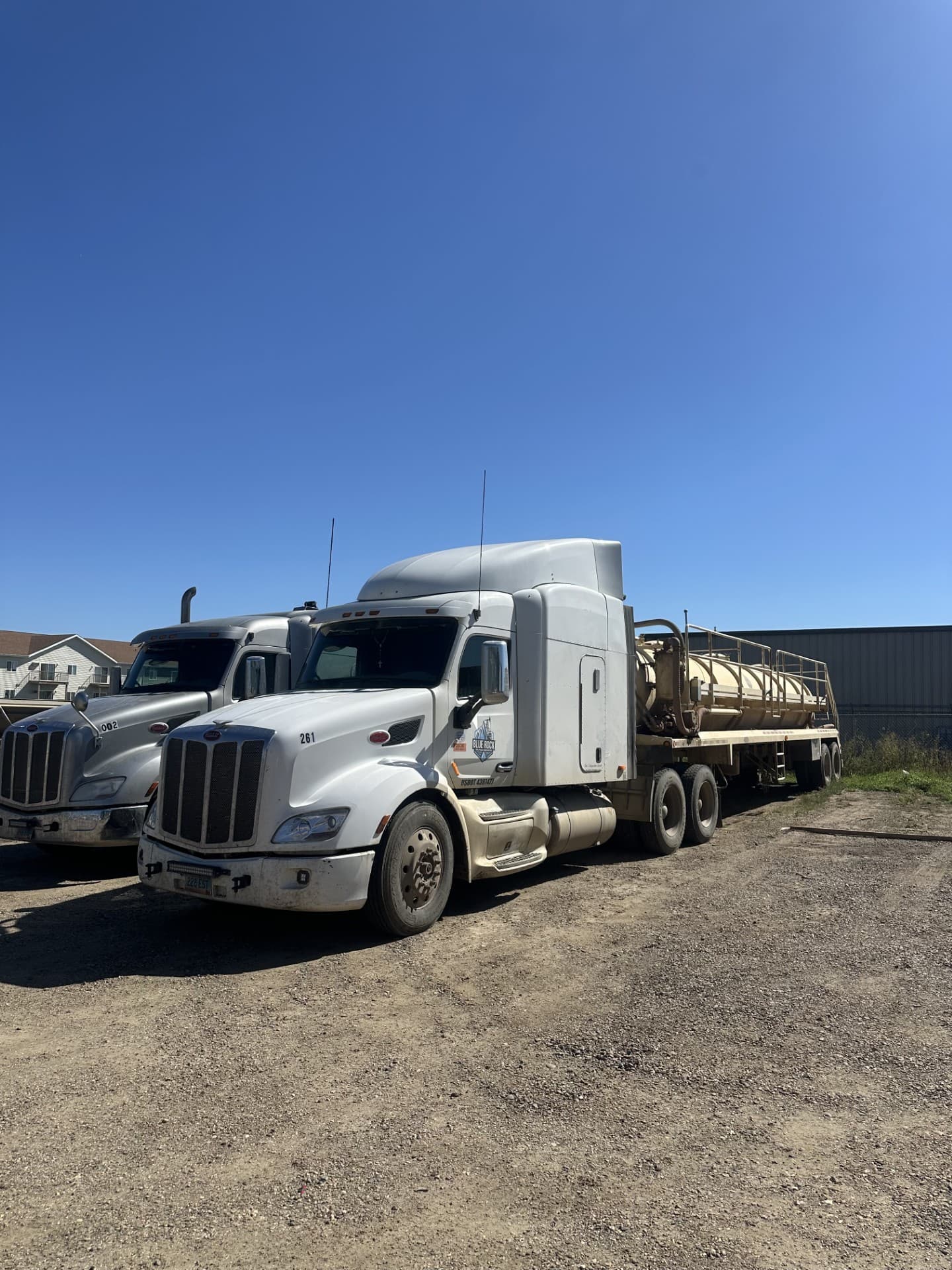 Blue Rock trucks lined up in the yard